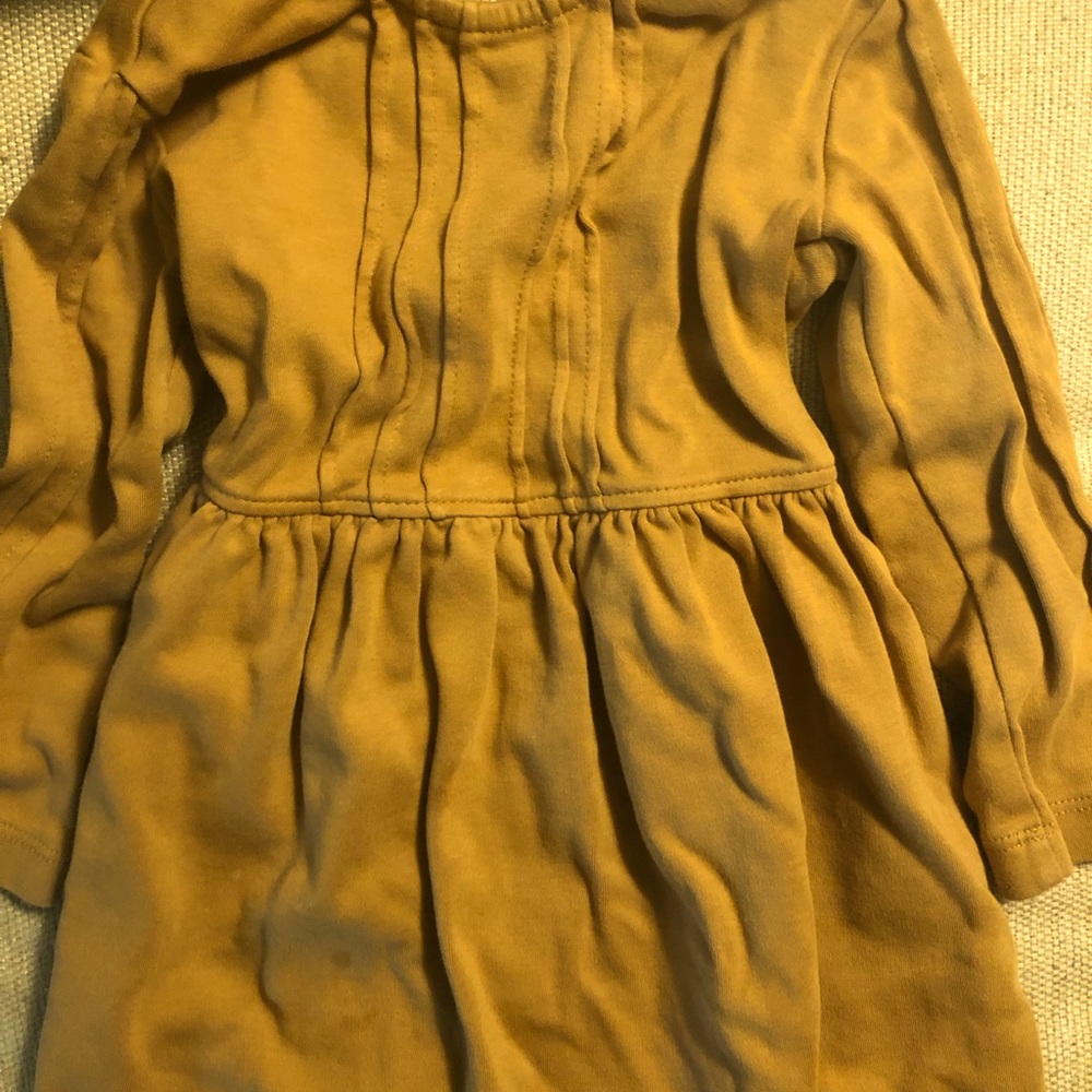 Kate Quinn long sleeved ruby dress